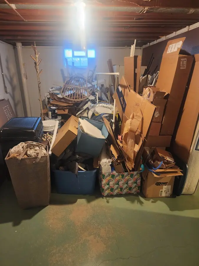 Roll-off dumpster container at job site for Yard Waste Dumpster Rental in Hampton